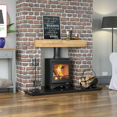 Elcombe wood burning stove lit with red face brick surround